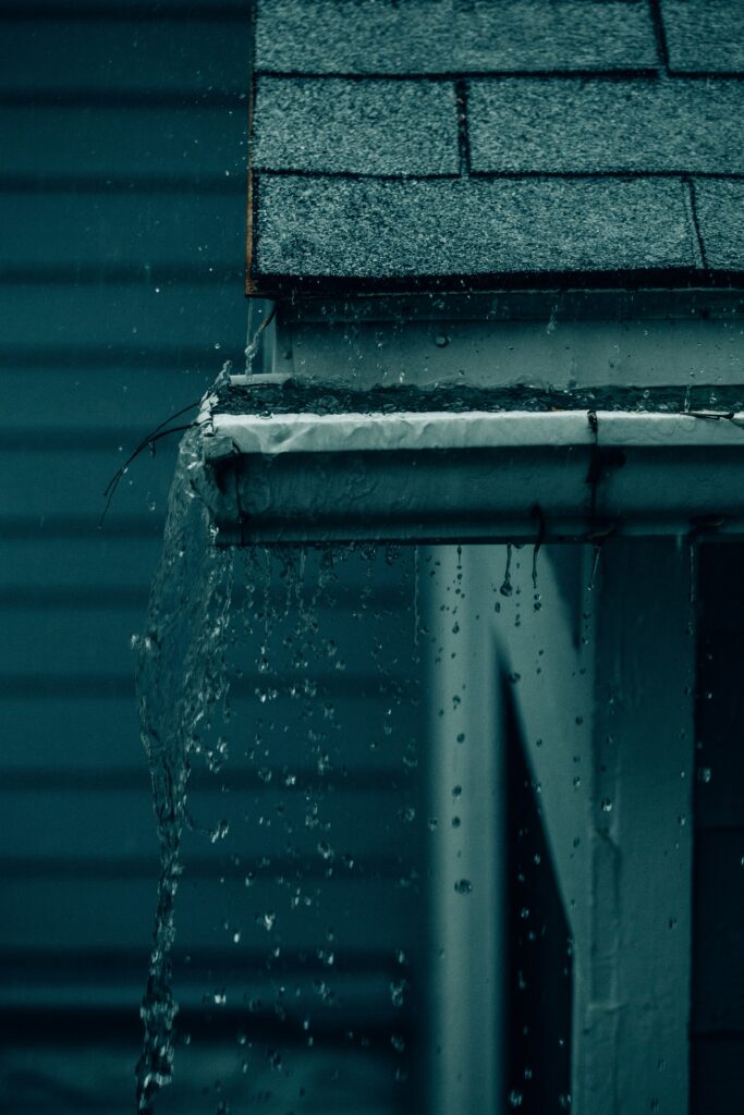 blocked overflowing gutter unblocking Renfrew